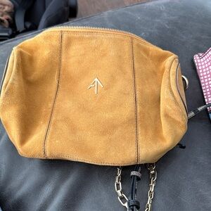 Manu Atelier cylinder suede bag in color terra